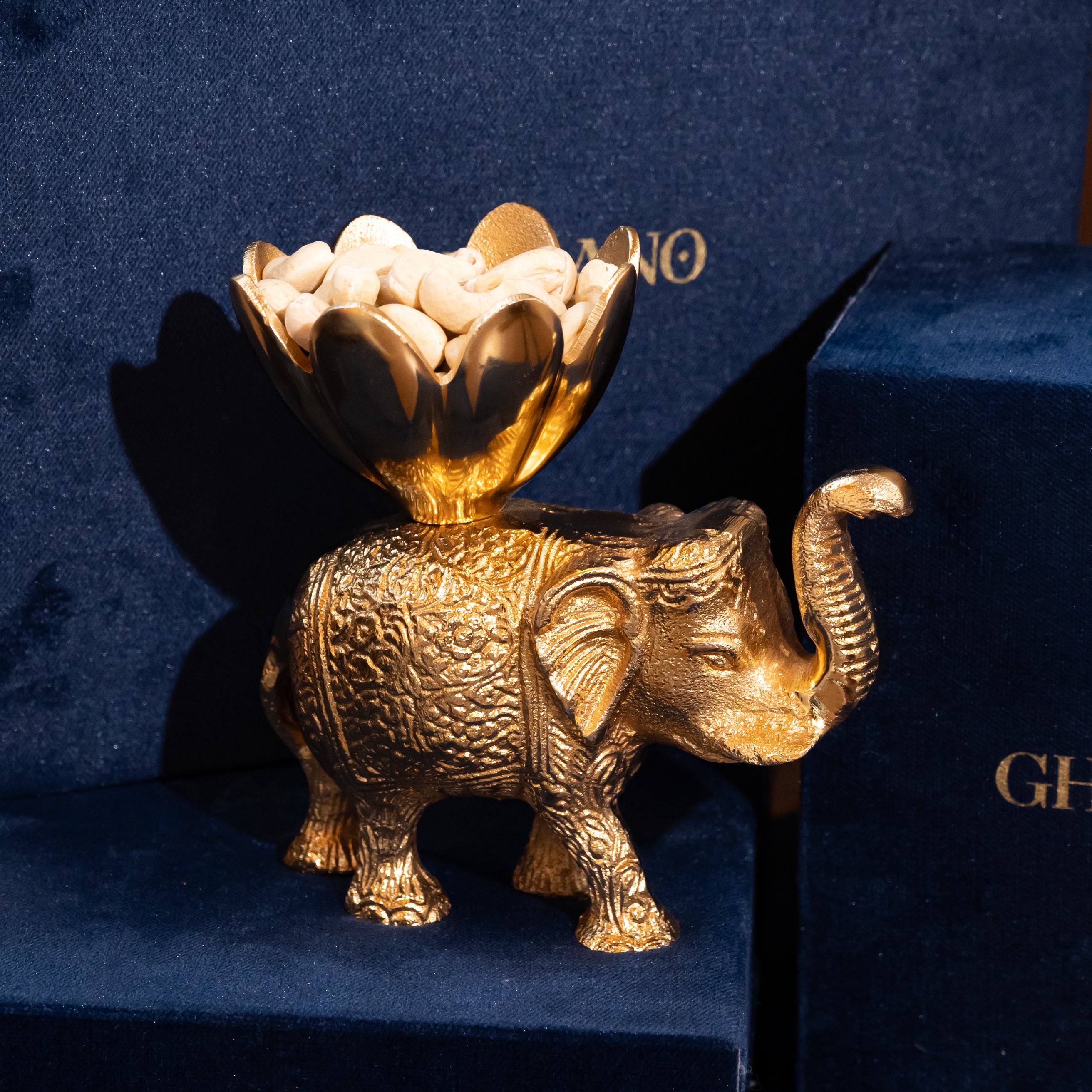 Gold-Plated Elephant with a Flower-Shaped Bowl on Its Back