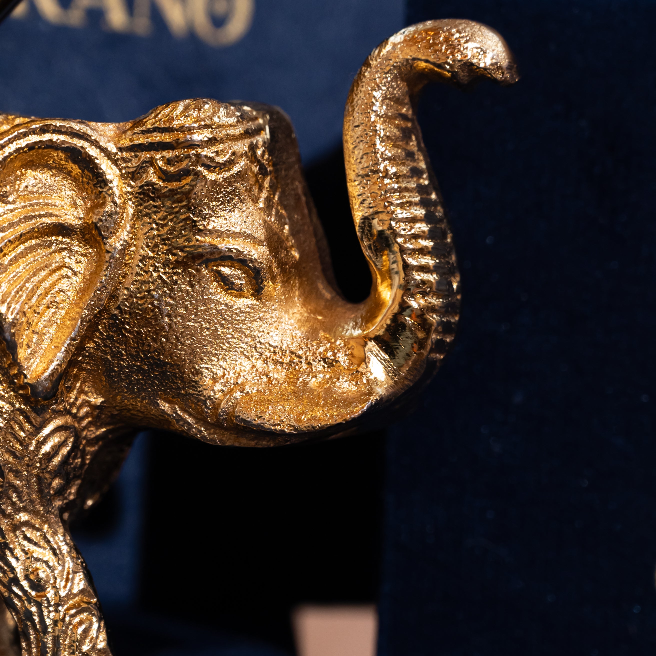 Gold-Plated Elephant with a Flower-Shaped Bowl on Its Back